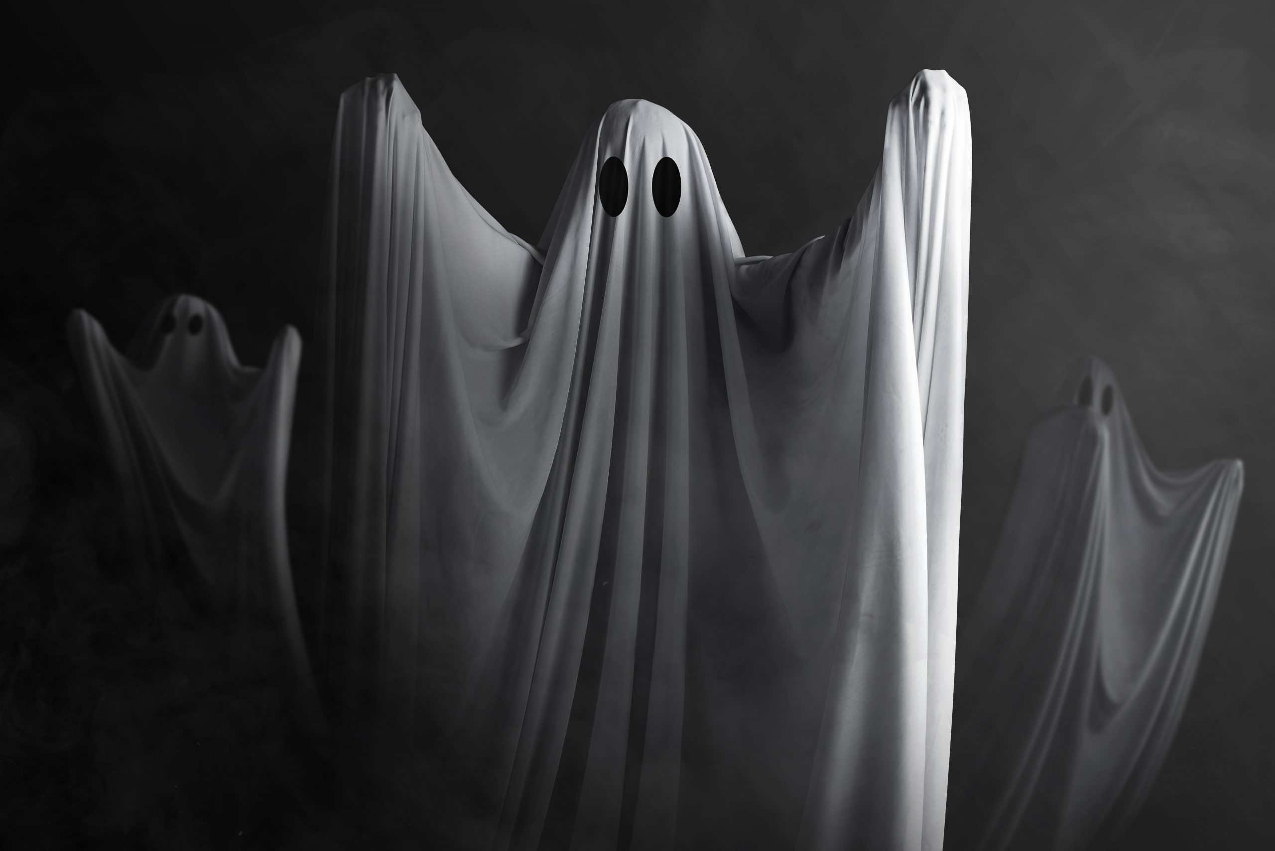 White ghost haunting with a dark background