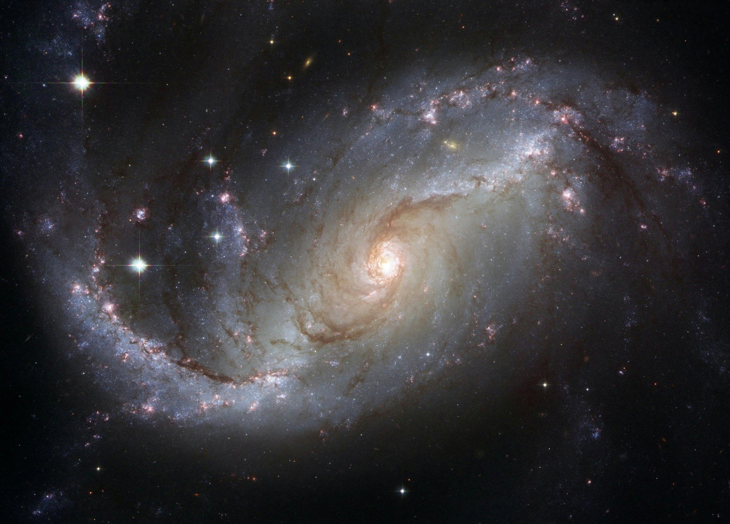 Una galaxia es una enorme colección de gas, polvo y estrellas unidas por la gravedad.